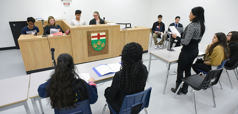 law students in a mock courtroom